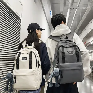 2025 Large capacity backpack couple schoolbag new junior high school high school college student schoolbag leisure travel bag lightweight backpack
