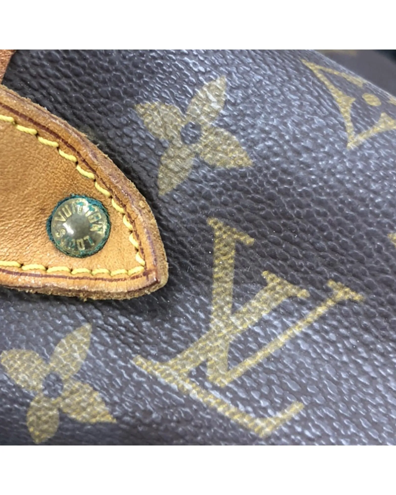 Monogram Saumur Bag with Leather Trim and Buckle Closures
