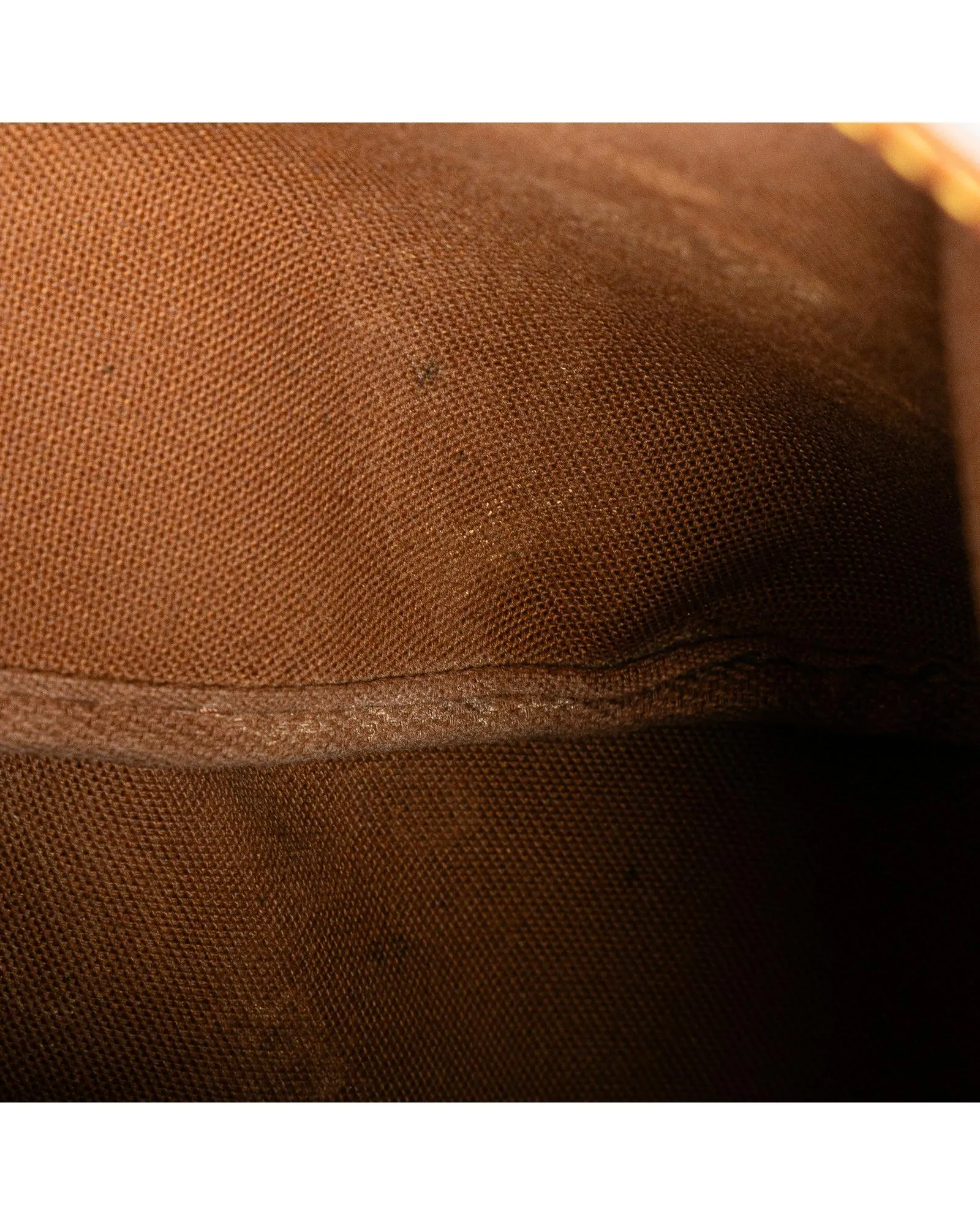 Monogram Saumur Bag with Leather Trim and Buckle Closures
