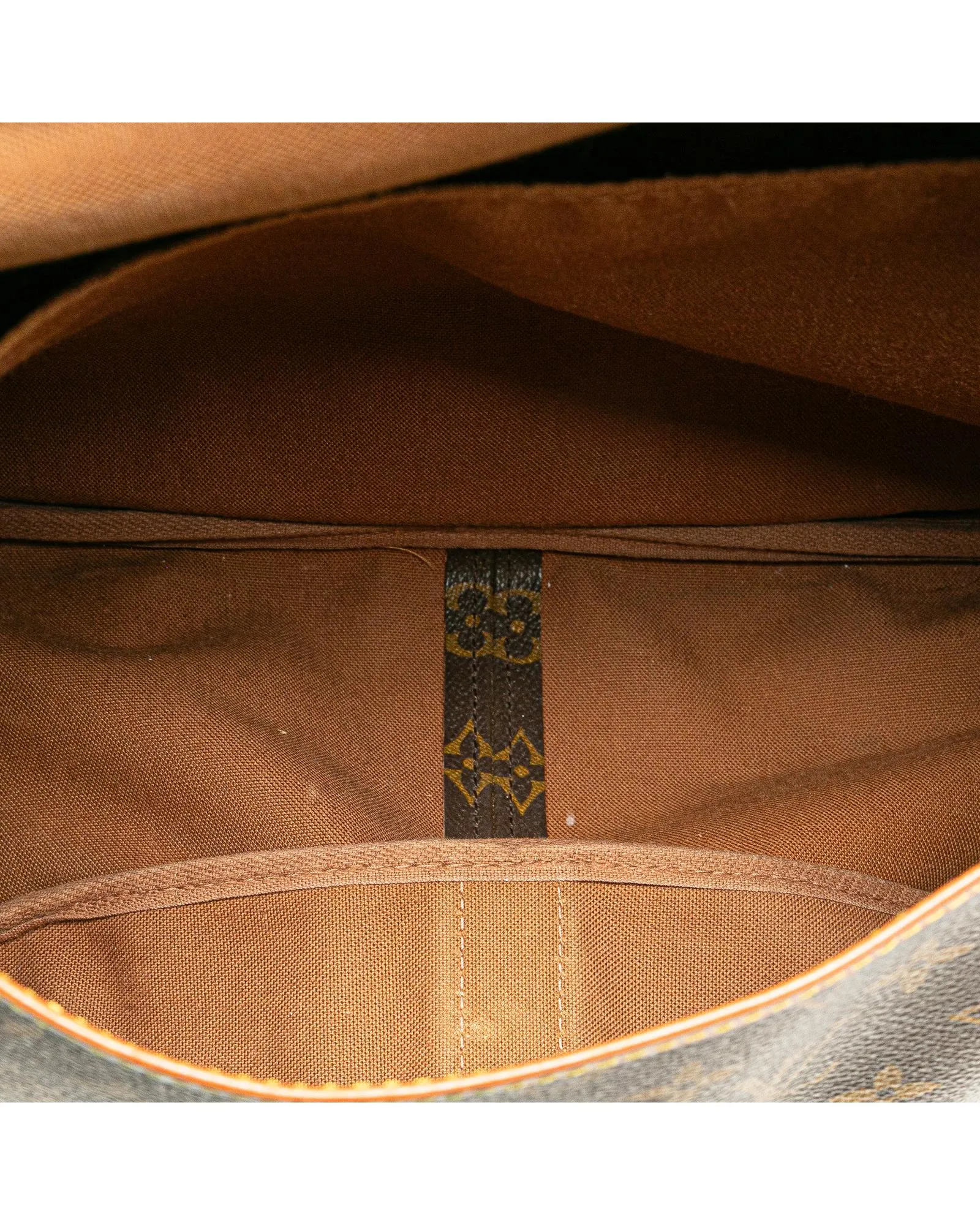 Monogram Saumur Bag with Leather Trim and Buckle Closures