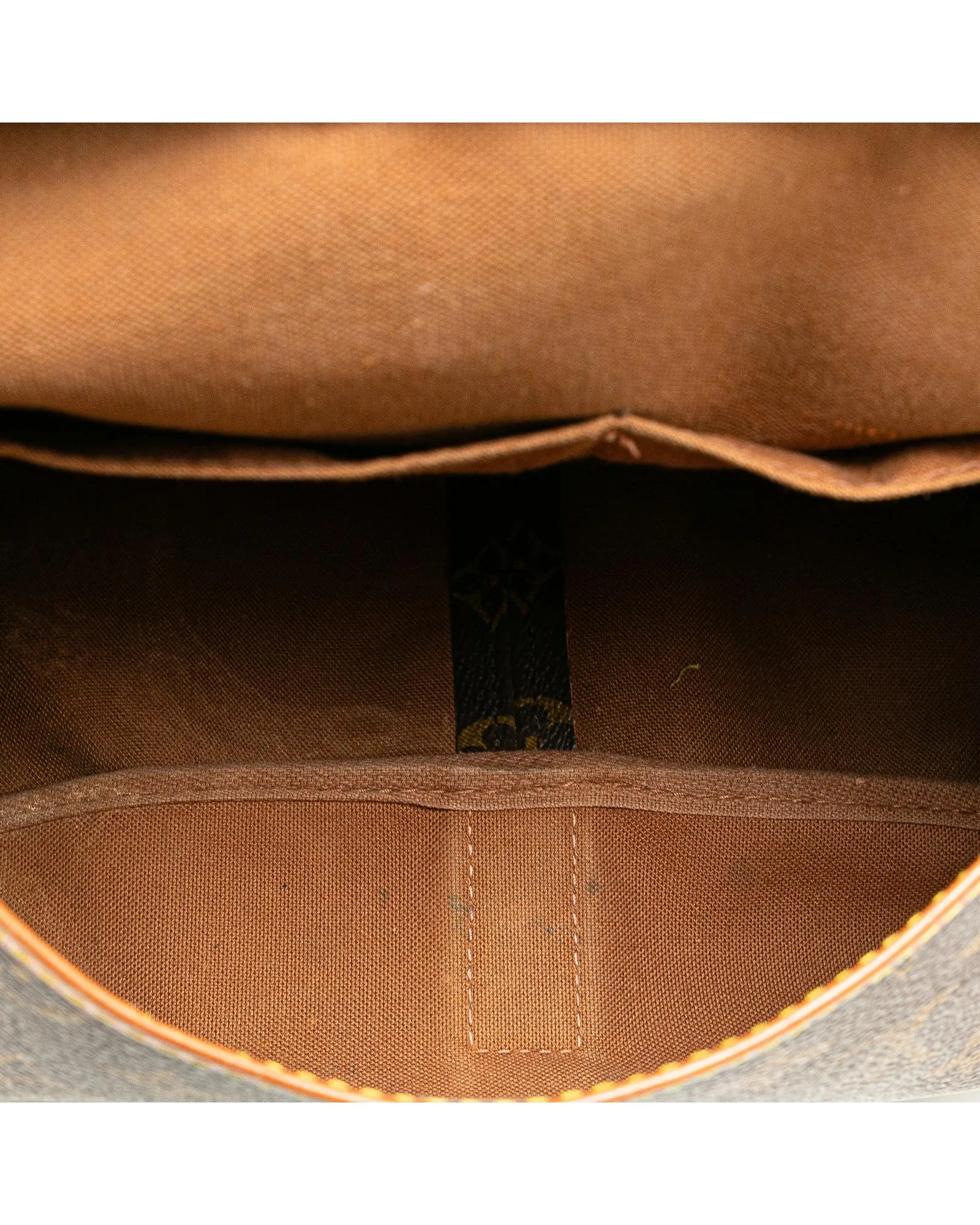 Monogram Saumur Bag with Leather Trim and Buckle Closures