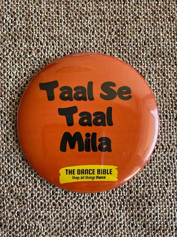 Taal Mila Orange Round Metal Pin Badge